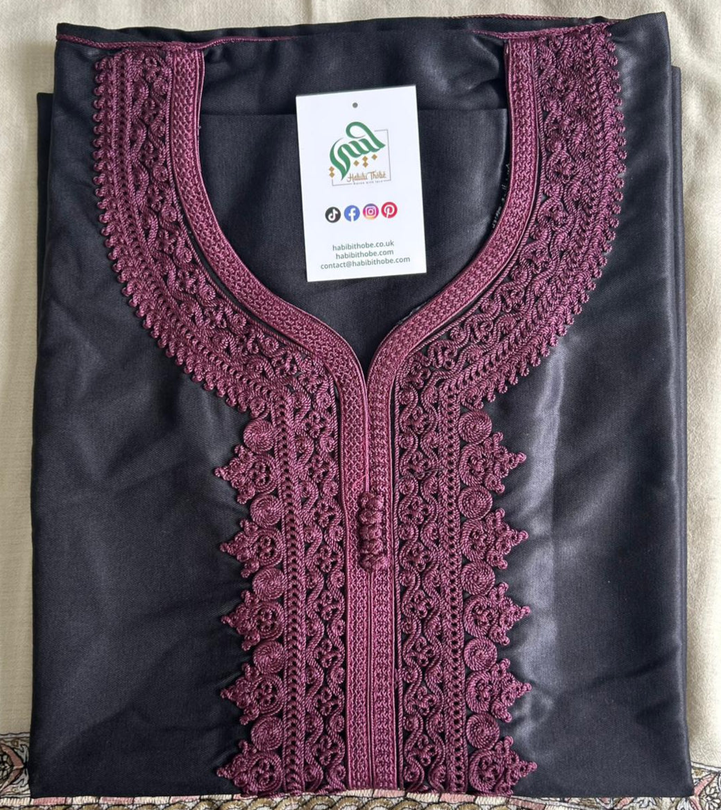"Black Moroccan Thobe featuring intricate royal maroon embroidery, side pocket, and opposite side slit for easy access."
