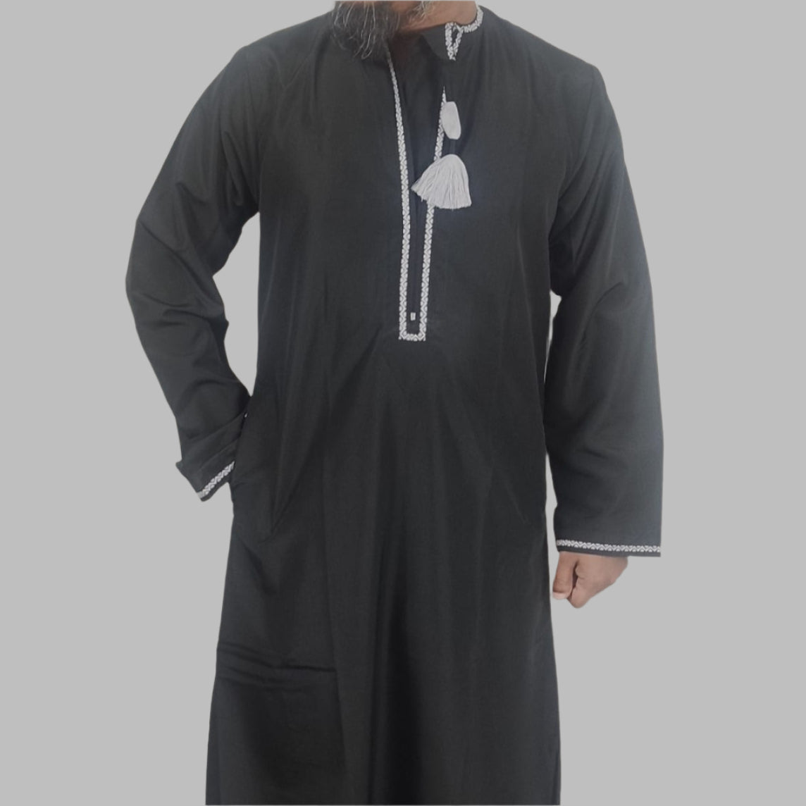 Royal_Black_Omani_Thobe model wearing showcasing the tassel and hand work