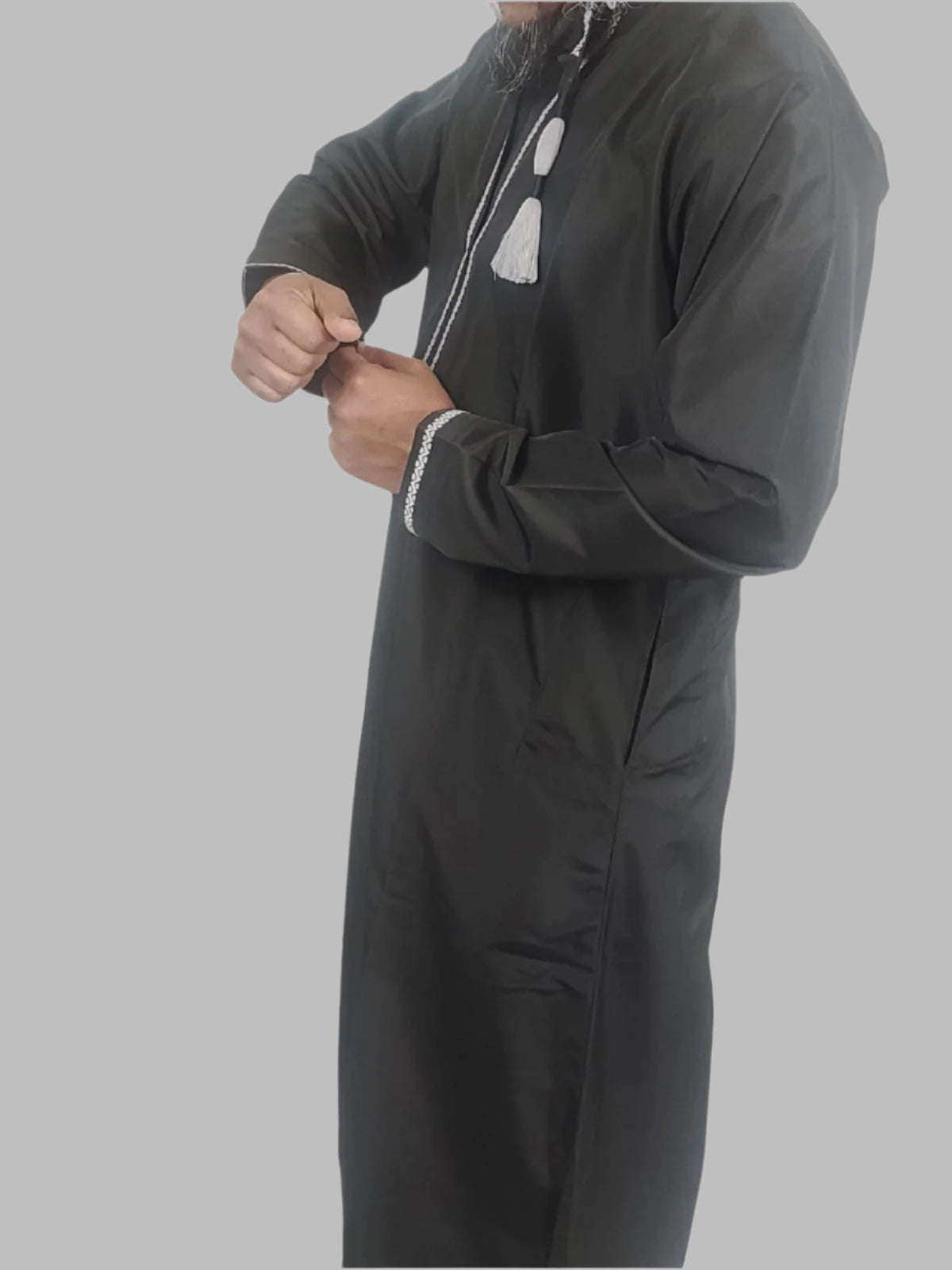 model wearing Royal_Black_Omani_Thobe_Right_side