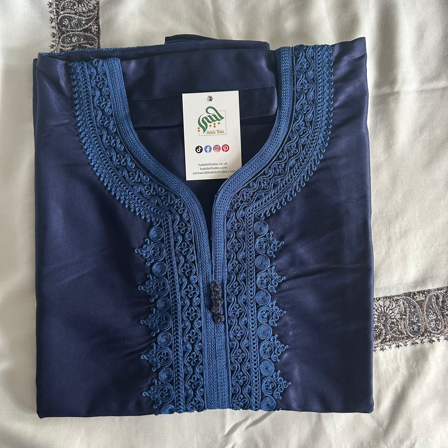 Bold stormy blue Gandoura with contrasting black embroidery detailing.