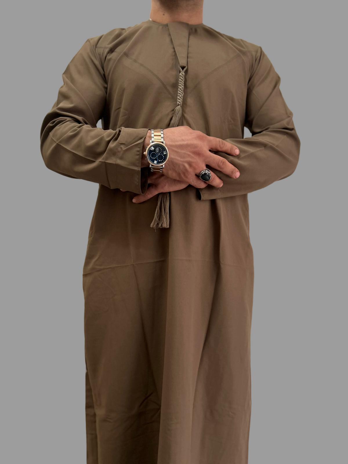 "Front view of the Basic Brown Emarati Thobe, showcasing its classic design, premium fabric, and comfortable fit, ideal for both formal and casual wear."