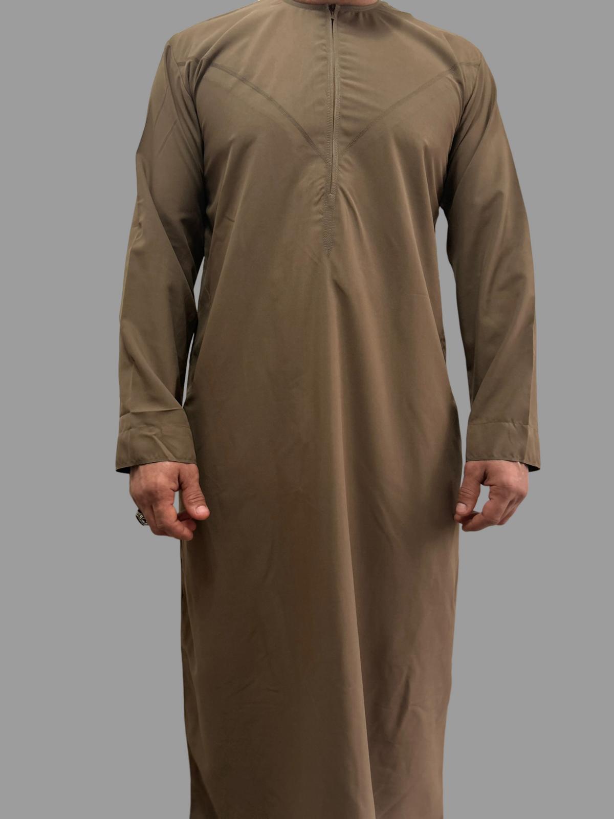 "Close-up of the fabric and stitching on the Basic Brown Emarati Thobe, focusing on the soft texture and durable construction for long-lasting comfort and detachable tassel."