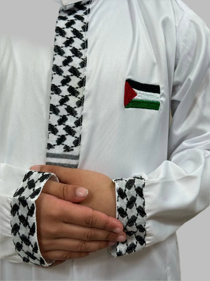Close-up details of Son Heritage Thobes featuring intricate sleeve keffiyah design and fine Flag embroidered on it