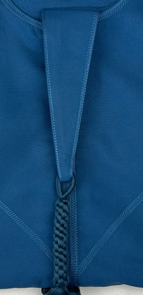 "Close-up of the fabric and stitching on the Premium Bright Blue Emarati Thobe, focusing on the soft texture and durable construction for long-lasting comfort."