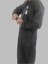 model wearing Royal_Black_Omani_Thobe_Right_side
