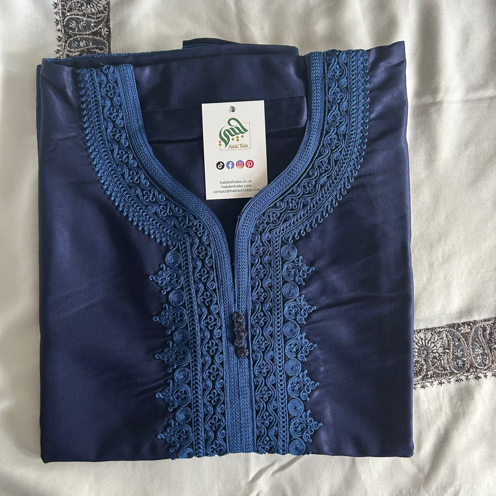 Bold stormy blue Gandoura with contrasting black embroidery detailing.