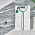 Boys wearing elegant Omani white thobe with green tassel for special occasions