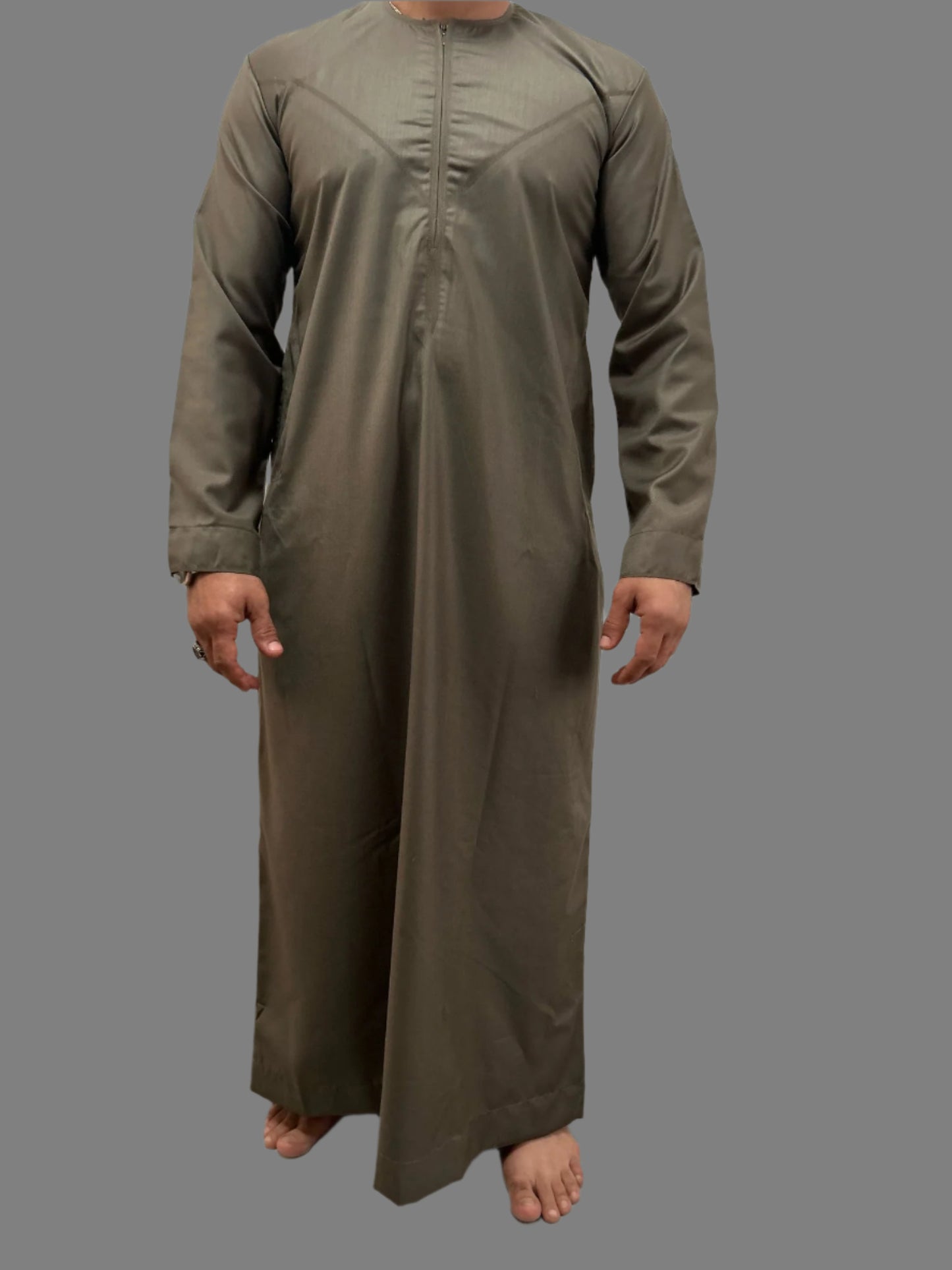 "Model wearing the Deluxe Emarati Mocha Thobe, demonstrating the comfortable fit, elegant design, and traditional style, with a modern touch."