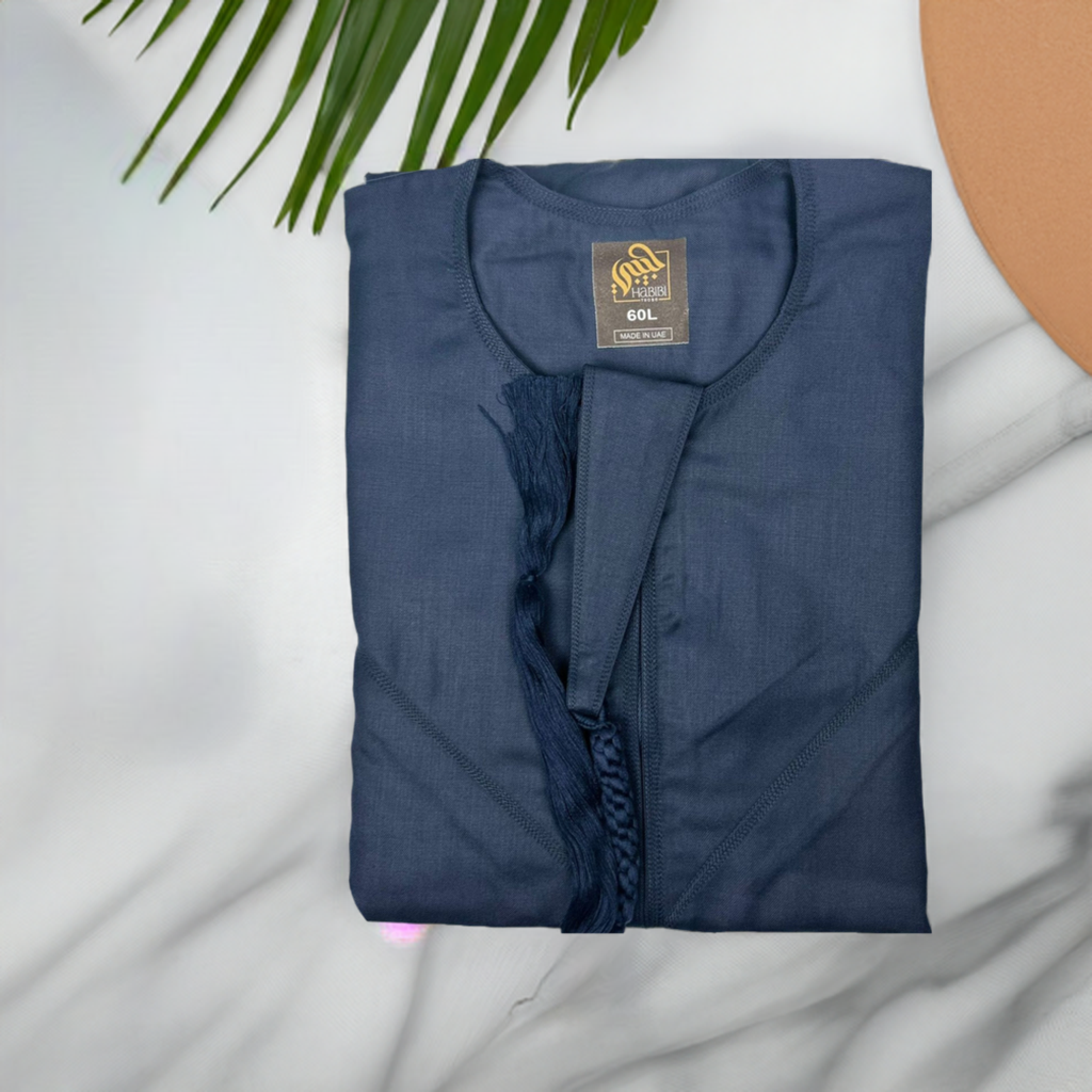 "Folded Deluxe Emarati Navy Blue Thobe, neatly displaying the premium fabric and refined design, perfect for storage and care."