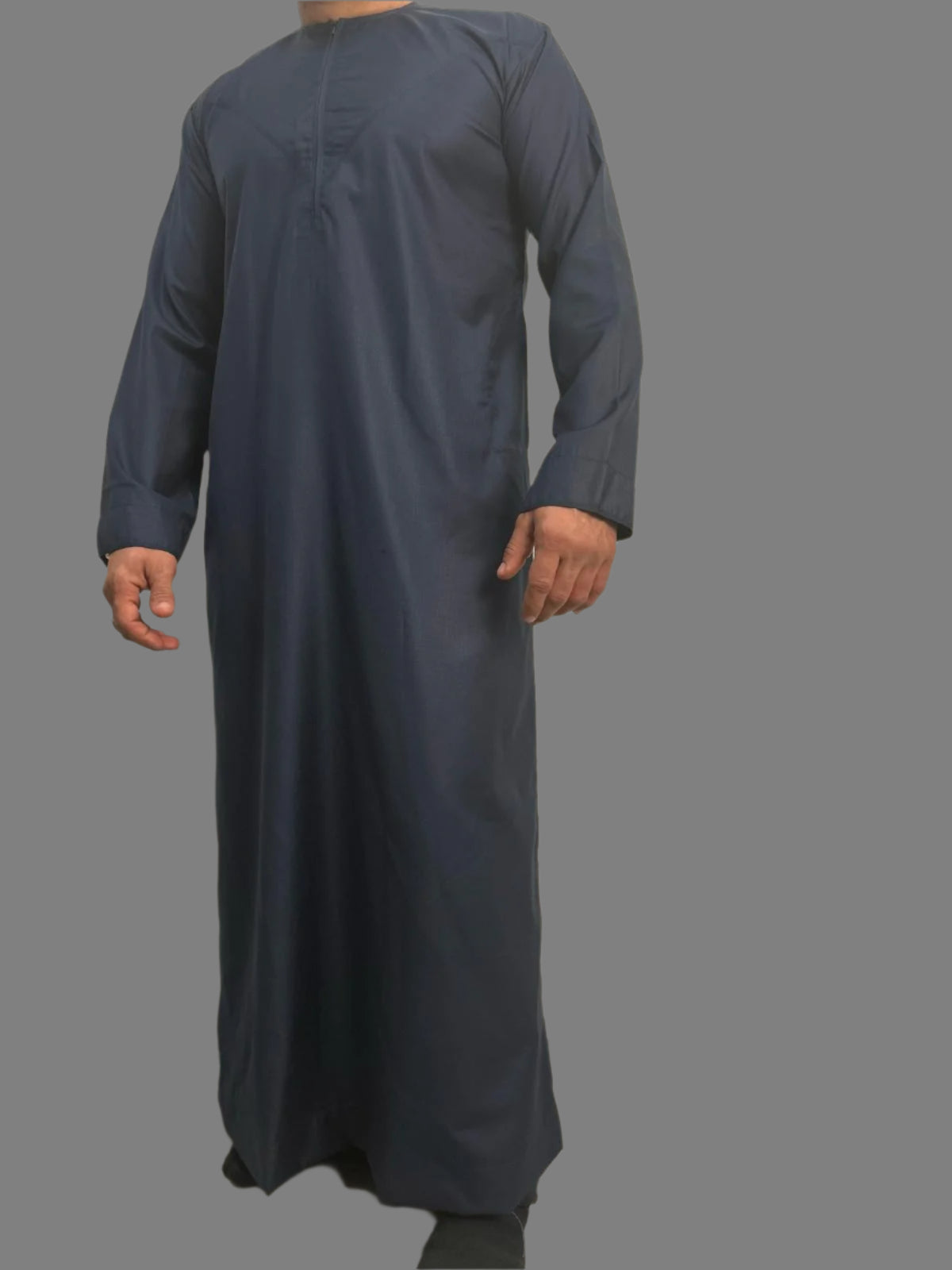 "Model wearing the Deluxe Emarati Navy Blue Thobe, demonstrating the perfect fit, classic navy blue color, and luxurious fabric for formal occasions for Eid and Ramadan 2025."