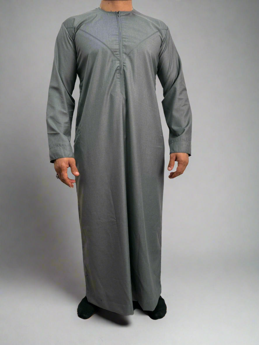 "Side view of the Deluxe Silver Emarati Thobe, highlighting its tailored fit and sleek silhouette for a modern traditional style for Ramadan and Eid 2025."