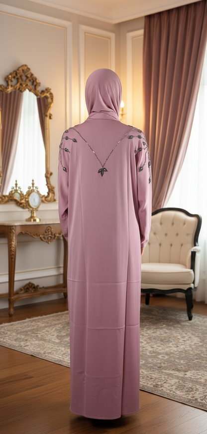 Person wearing a pink abaya in a decorated room with curtains and furniture.