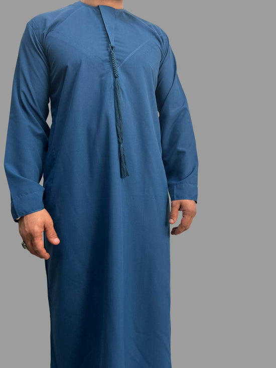 Premium bright blue Emarati thobe made from breathable fabric with detachable tassel, tailored fit for formal and daily wear