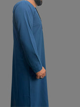 "Side view right of the Premium Bright Blue Emarati Thobe, emphasizing its clean lines and refined detailing for a polished, traditional appearance."