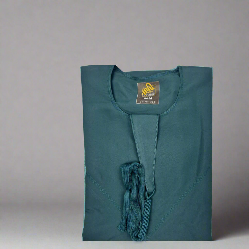 "Folded Premium Teal Blue Emarati Thobe, neatly showing its high-quality fabric and stylish design for easy storage."