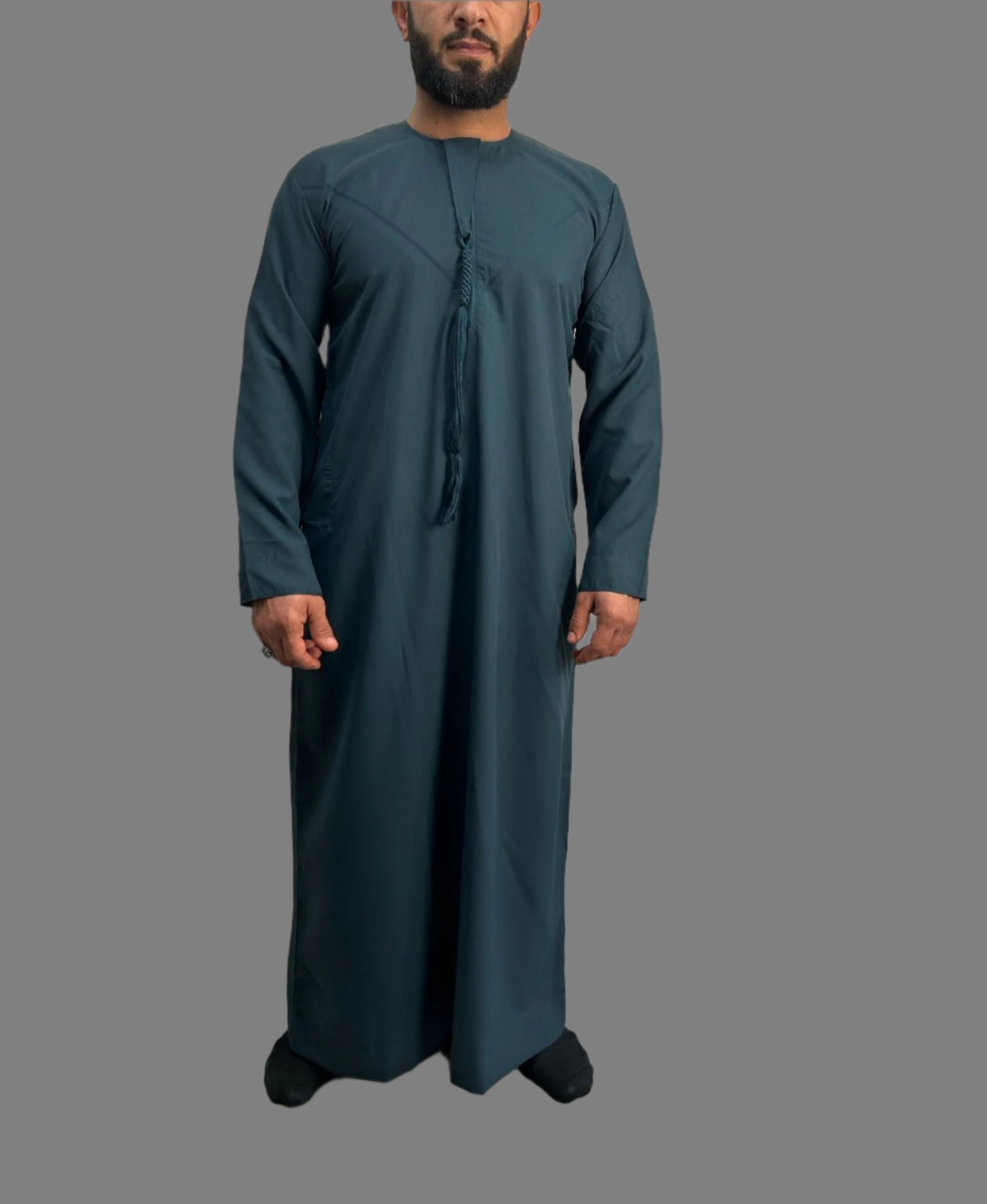 "Front view of the Premium Teal Blue Emarati Thobe, showcasing its elegant design and premium fabric for a sophisticated look for Ramadan and Eid 2025."