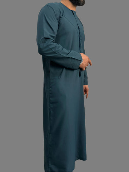 "Left Side view of the Premium Teal Blue Emarati Thobe , highlighting its tailored fit and clean lines for a modern yet traditional style."