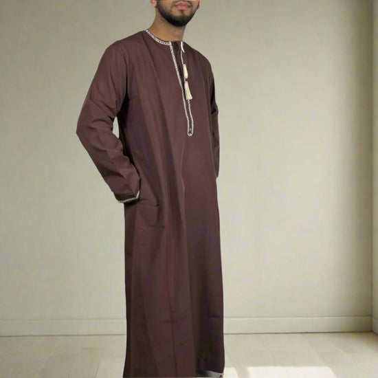 OMANI Sultan dark maroon thobe with gold accents showcasing premium craftsmanship and elegant fit